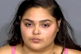 Woman charged with fatally shooting driver after honk at green light