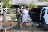 Emmanuel Haro’s father seen helping police search for baby’s body