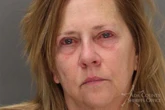 Passenger arrested after police say she assaulted flight crew