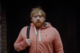 Rupert Grint is plagued by Ed Sheeran in new music video