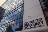Rap group lawyer charged after accusation of tipping off gang member