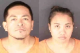 Couple left kid on the side of the road with bag of guns, cash: cops