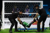 Two robots stretchered off in world’s first AI football match