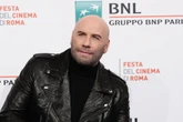 John Travolta surprises Grease fans by reprising Danny Zuko role