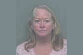 Woman, 71, held family at gunpoint on false suspicions, cops say