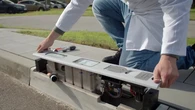 Can you find this sidewalk EV charger? It’s hiding inside the curb