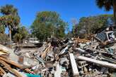 This tiny Florida island has been hit by 3 hurricanes in 13 months. But most residents are staying put