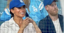 Meghan y Harry aparecen por sorpresa en un partido de béisbol y enfurecen a los aficionados