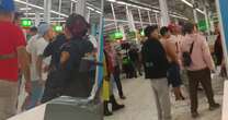 La policía capitalina aprehende a personas que atacaron a uniformados en supermercado