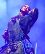 Erykah Badu Teases New Music & Stops Show To Shout Out ASL Interpreter At Essence Fest