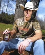 Snake-Wrangling Heartthrob Rob Rausch Talks The Traitors, Camo & Whiskey