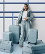 Drenched in Denim: Shay Mitchell Models Gap x Béis Travel Collaboration