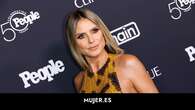 Heidi Klum se atreve con el escote 'side boob' y el mini vestido de leopardo más sexy a los 50