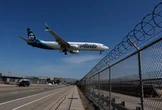Airlines are absorbing up to 50% of surging jet fuel costs. Alaska is still betting on premium international flights