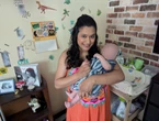 My husband, our newborn, and I live in my 110-square-foot childhood room in my parents' home. We want more space, but can't afford it.