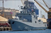 A Russian warship sailing between England and France fired warning shots at a British civilian yacht