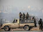 Syrian rebels say they are surrounding Damascus, threatening Assad's hold on power