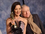 Michelle Yeoh says that despite constant work travel, she and her husband have found ways to make it work