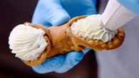 Inside a family-owned Brooklyn bakery where they've been hand rolling cannoli the same way for 50 years