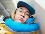 I've spent 190 hours on long-haul flights. Here are 11 tips for surviving 6 or more hours stuck in economy.