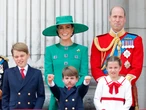22 candid photos of Prince William, Kate Middleton, and their children over the years