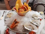 I dined at Dock's Oyster House, a 128-year-old seafood restaurant. The $47 seafood tower was worth every dollar.