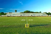 The family of a Mississippi high school football player who died after being forced to practice in 103-degree heat is now suing the school district