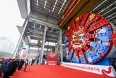 China unveiled new dragon-themed drillers that it hopes will build the world's 'longest undersea high-speed railway tunnel'