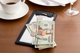A California restaurant owner claims a table of diners left fake $100 bills and walked out before their server could check their money