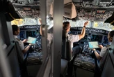 Pilots and airlines are using AI tools to better time the seatbelt sign