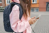 I gave my daughter a cellphone when she was 8. I still don't think they belong in schools.
