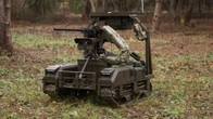 Ukraine's robots are carrying the heavy century-old M2 Browning machine gun into battle so troops don't have to