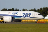 An 'intoxicated' passenger bit an attendant on a flight from Japan to Seattle, forcing the plane to turn around
