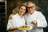 I cooked with Wolfgang Puck at Spago. He showed me how to make his famous pizza.