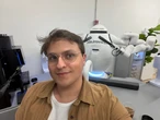 I went to ElevenLabs' NYC pop-up. A robot poured me cold brew before I haggled with an AI shopkeeper.