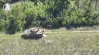 Video shows a wounded Ukrainian soldier being rescued by a US-made Bradley after a friendly drone spotted him  