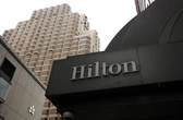 Hilton's CEO says he sees a C-shaped economy emerging in the US