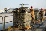 60 bundles of food fell into the sea as a US military C-130 aircraft attempted to drop aid into war-torn Gaza