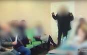 A Ukrainian councilor set off grenades in a meeting over an apparent pay dispute, video shows