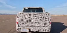 Ford's $30,000 EV truck is under wraps. Its camouflage is an ad.