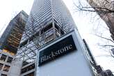 Blackstone's mortgage fund slashes dividend as slump in office puts it under pressure 