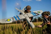 Ukraine's drone operators say they have to negotiate safe passage past friendly jammers, sometimes over group chat