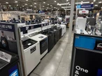 Some shoppers are spending big money on 'craft ice' fridges and high-tech washing machines, Lowe's exec says