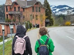 I'm an American raising 2 kids in Switzerland. They started walking to school without me when they were in kindergarten.