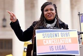 A major student-loan company owes debt of its own &mdash; but it's continuing to collect millions of borrowers' monthly bills. A Democratic lawmaker says it's time for it to pay up. 