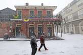 Photos show landmarks across the South covered in snow during its rare winter snowstorm