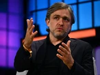 This CEO spent years betting on remote work. Now he's evolving his stance because of AI.
