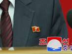 North Koreans have a new fashion accessory — Kim Jong Un lapel pins. Here's what they mean for the supreme leader's legacy. 