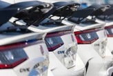 Automakers are tapping the brakes on the EV revolution. Here are all the manufacturers rolling back their plans.