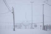 Over half of flights have been canceled in Washington, DC as Storm Blair brings heavy snowfall